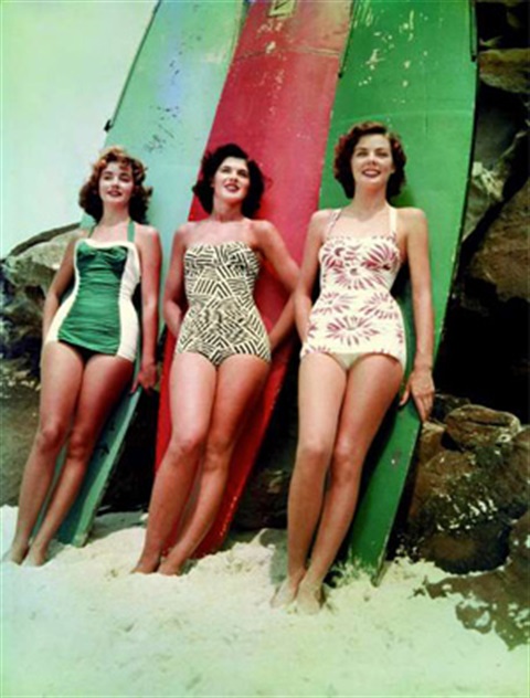 Decked out in their favourite swimsuits the three placegetters in the 1952 Miss Pacific pageant post on Sydney's Bondi Beach