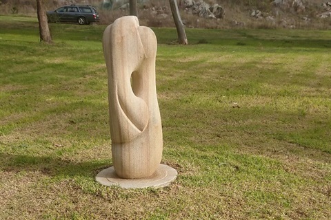 JAN SHAW, Compassion 2004, carved sandstone. Gift of Macquarie University 2020. Photo by Effy Alexakis.